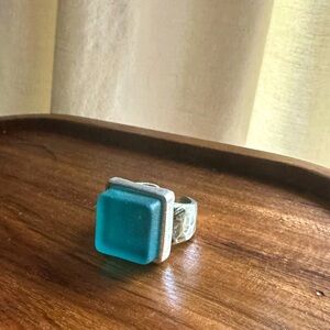 Adjustable ring made from repurposed Icelandic vodka bottle.